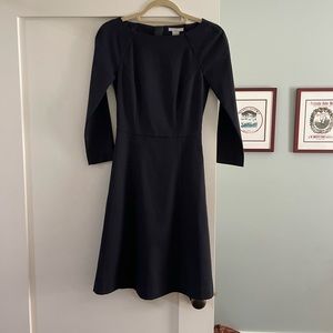 H&M navy blue dress with zipper accent down the back. Worn once.